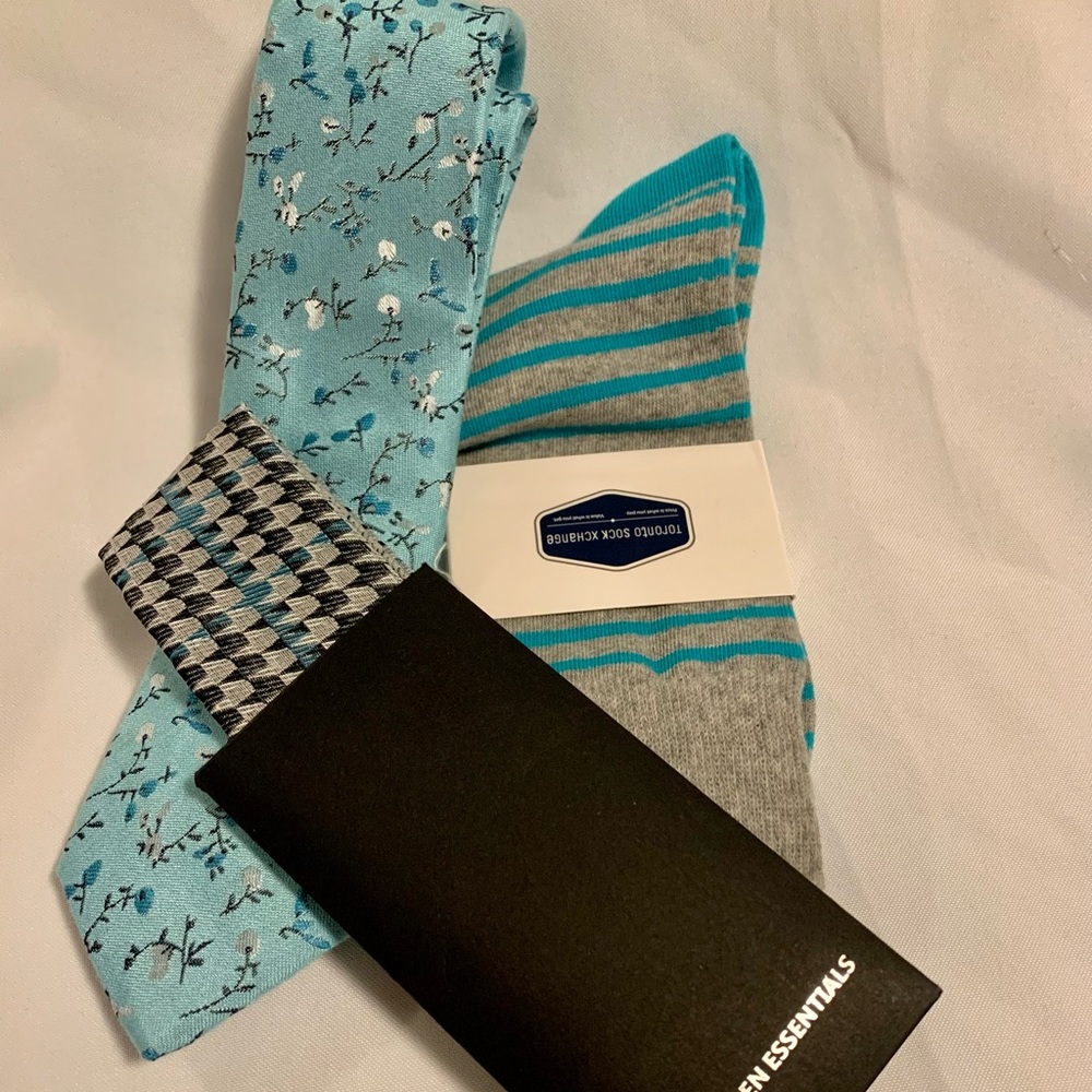 Light blue cherry blossom tie with a coordinating pair socks and pocket square!
